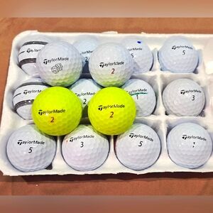 16 Taylormade TP5 and TP5x golf balls. 14 white, 2 Yellow. Excellent Condition.